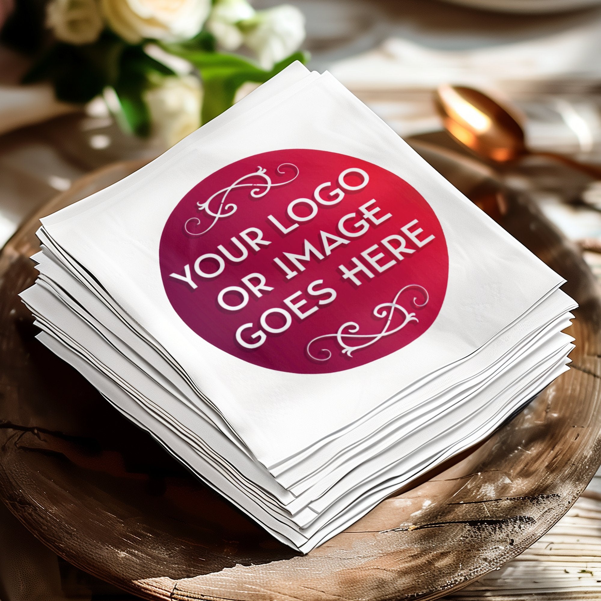 Stack of white napkins with a customizable red circular logo area.