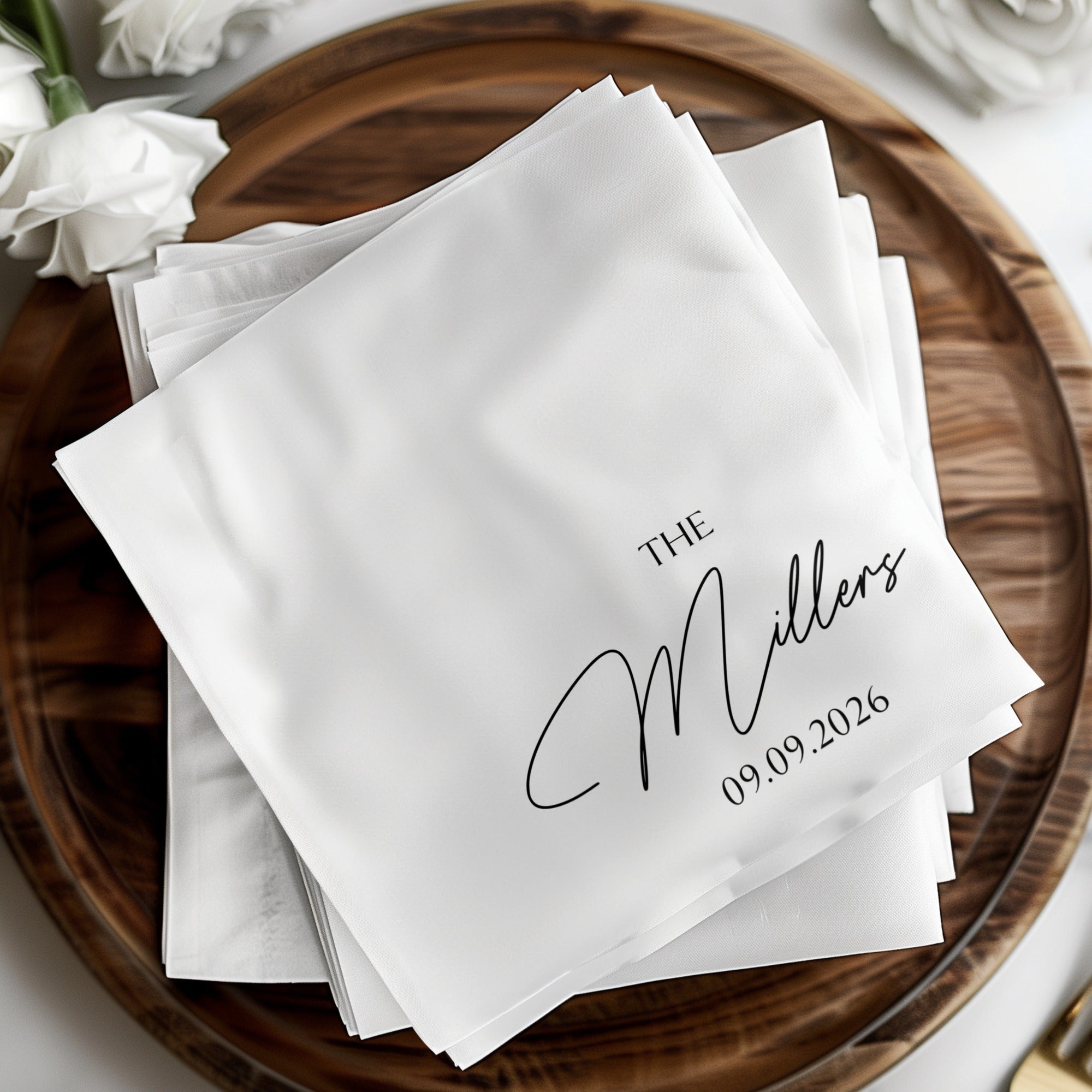 White napkins with "Miller" and "09.09.2026" in black script.